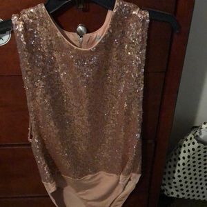 Size large rose gold Body suit